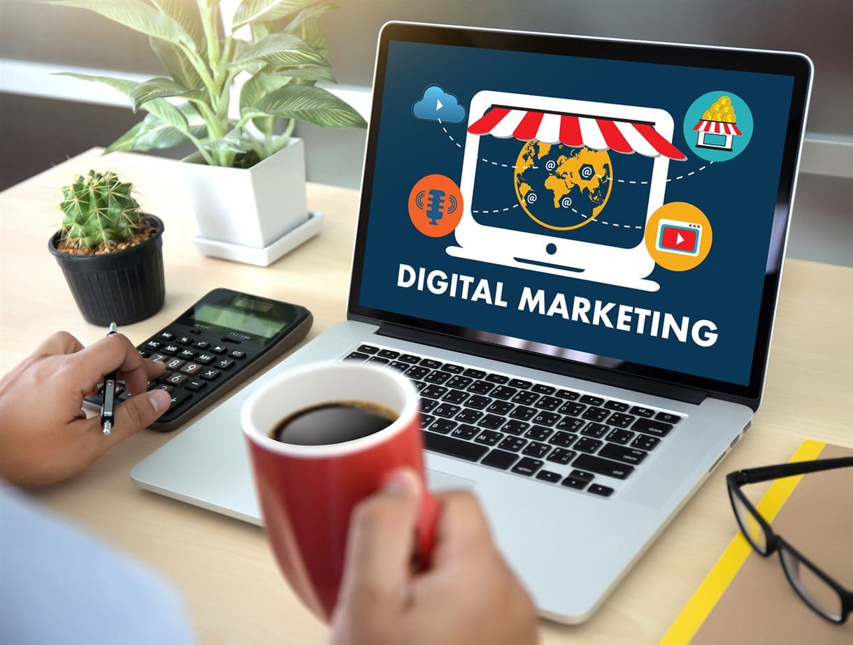 Laptop screen displaying Digital Marketing logo