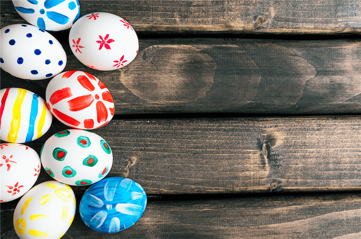 Painted eggs on a wooden table