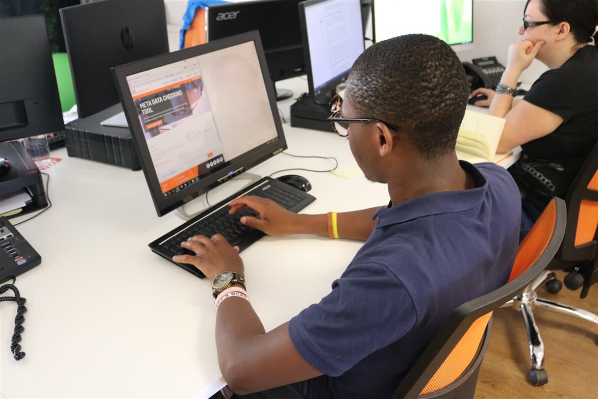 Person working at computer in MCM office