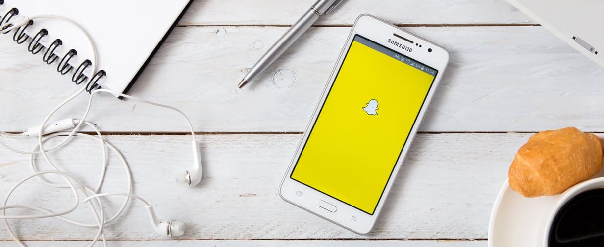 Snapchat logo on mobile phone screen