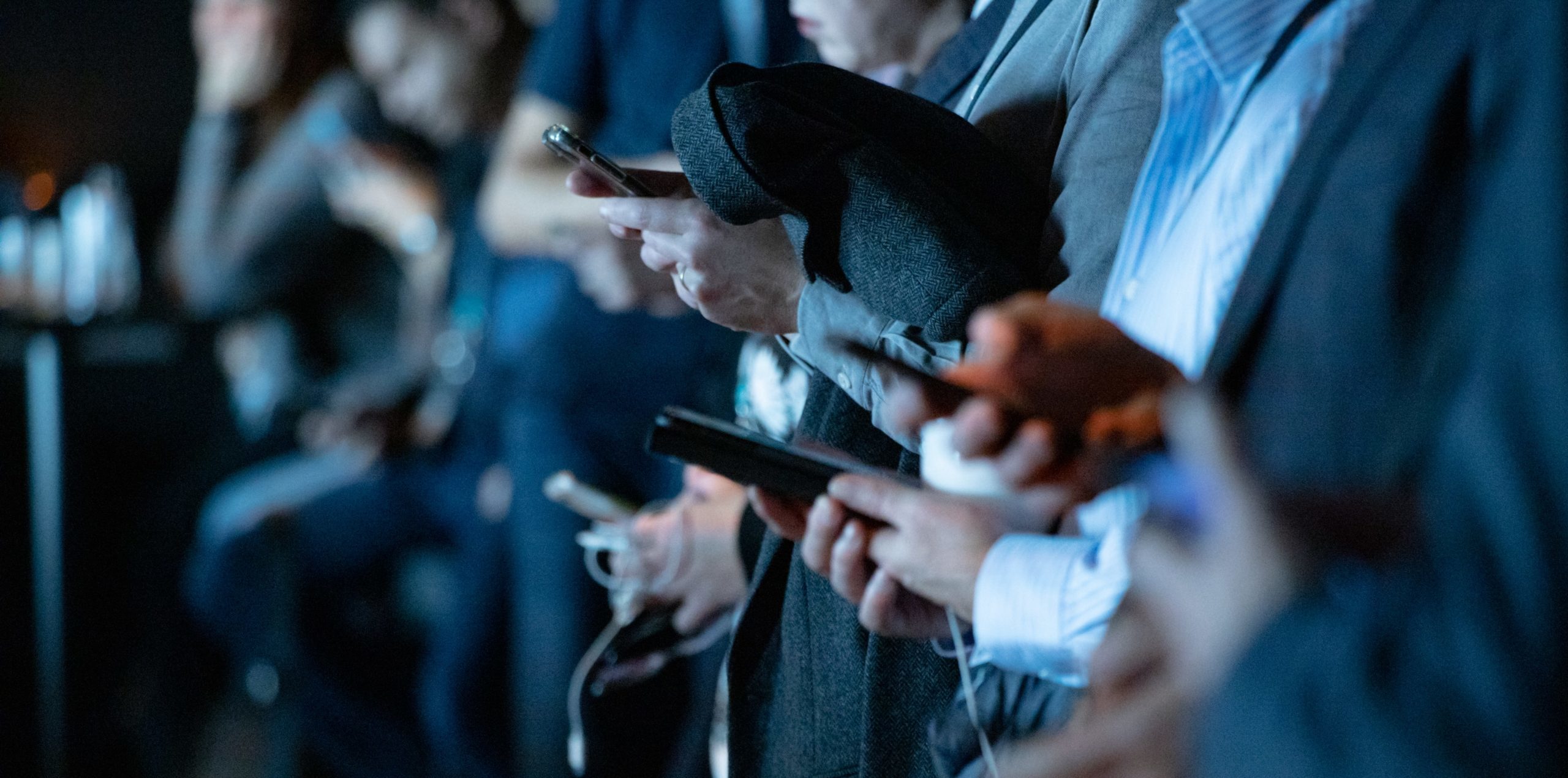 Business people using mobile phones