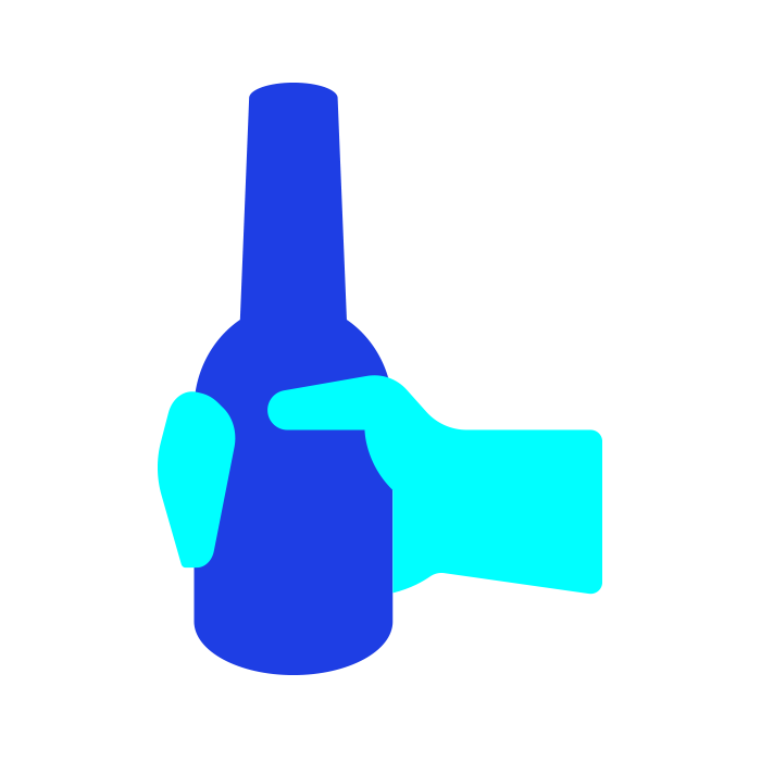 Light blue hand holding a dark blue bottle