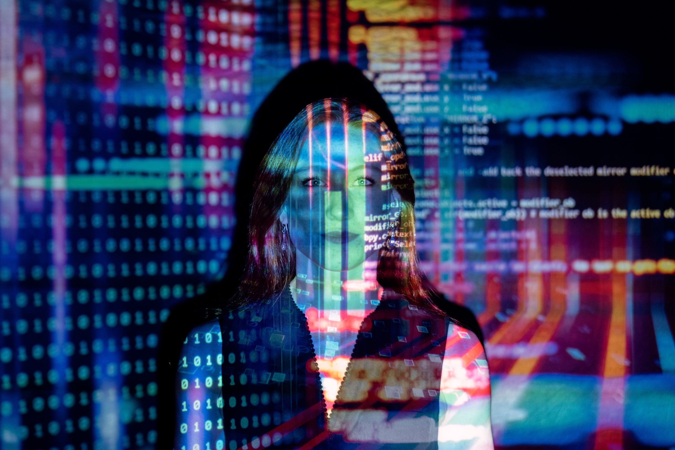 code projected over a woman