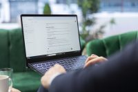 Alt text: professional on a laptop using ChatGPT